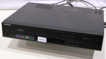 Samsung 6 head VHS and DVD player/recorder. Not available for in-house P&P