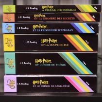 Six French first edition Harry Potter paperback books, lacking Deathly Hallows. UK P&P Group 2 (£