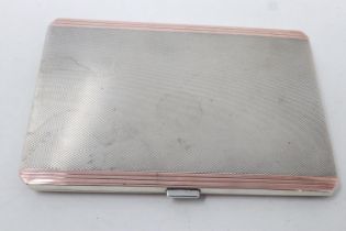 Hallmarked silver cigarette case with rose gold coloured edges, Birmingham assay, 130 x 90 mm, 156g.