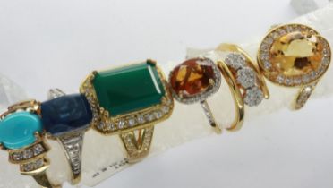Six gold plated stone set rings, mixed sizes. UK P&P Group 0 (£6+VAT for the first lot and £1+VAT