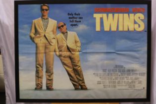 Large framed film poster, Twins, starring Arnold Schwarzenegger and Danny Devito, overall 105 x 80