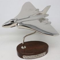 Chrome Vulcan bomber on wooden base, H: 20 cm. UK P&P Group 2 (£20+VAT for the first lot and £4+