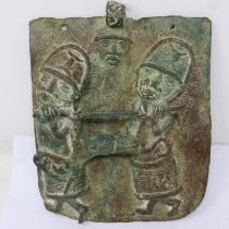 Cast Benin bronze plaque of two men carrying a deer, 18 x 23 cm. UK P&P Group 2 (£20+VAT for the