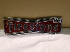 Cast aluminium Firestone Tyres plaque. W: 25 cm. UK P&P Group 1 (£16+VAT for the first lot and £2+