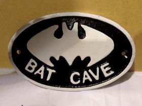 Cast iron Bat Cave sign. W: 15 cm. UK P&P Group 1 (£16+VAT for the first lot and £2+VAT for