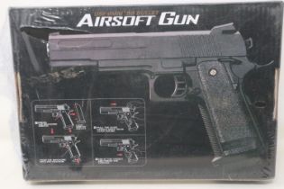 New old stock airsoft pistol, model V19 in silver, boxed and factory sealed. UK P&P Group 1 (£16+VAT