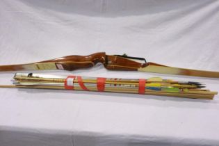 Wilson Brothers 64in Black Widow archery bow, serial number 12287 (dating to 1965), with a