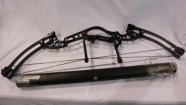 Merlin Excalibur compound bow, serial number 50692, with a sleeve of arrows. UK P&P Group 3 (£30+VAT