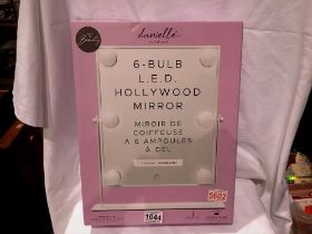 Danielle Creation six bulb led Hollywood mirror, battery powered, new and unused. Not available