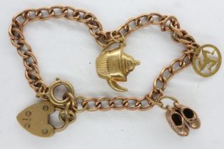 9ct gold charm bracelet with padlock clasp and three 9ct gold charms, L: 18 cm, 9.6g. UK P&P Group 0