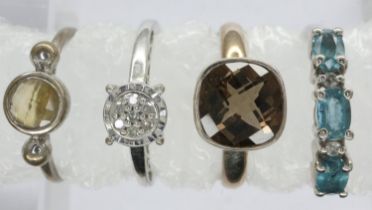 Four mixed silver rings including TGGC 925 silver, all stone set, one with diamonds, mixed sizes. UK