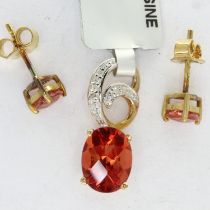 9ct gold pendant set with red andesite and diamonds together with a pair of matching stud