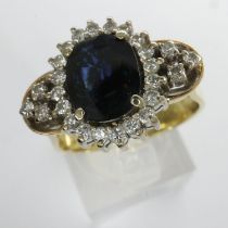 18ct yellow and white gold cluster ring set with sapphire and diamonds, 0.52ct diamonds, size P, 7.