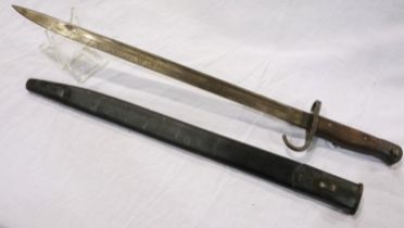 A British M1907 sword bayonet with hooked quillon, dated 1909, maker Sanderson. Unit marking on