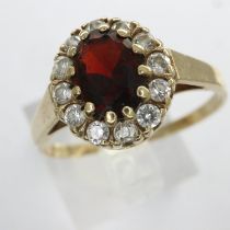 9ct gold cluster ring set with garnet and cubic zirconia, size R/S, 2.5g. UK P&P Group 0 (£6+VAT for