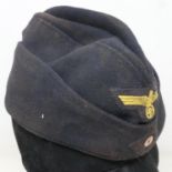 WWII German Kriegsmarine side cap with insignia of the U-858 Which surrendered at Delaware, USA on
