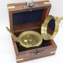 Brass sundial and compass in wooden case. UK P&P Group 1 (£16+VAT for the first lot and £2+VAT for