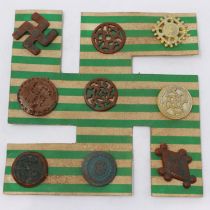 Third Reich Archaeology Set of Winterhilf Tinnie badges. The set of nine badges are a portrayal of