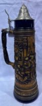 Gerzit 1.5L German stein with pewter lid decorated with a tavern scene, blue glazing to top and base