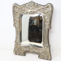 Hallmarked silver framed bevelled edge wall mirror, Birmingham assay, overall 23 x 32 cm. Not