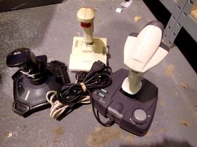 Three computer game controllers, including a Quickshot. Not available for in-house P&P