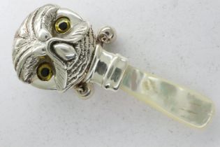 Sterling silver owl form baby rattle with mother of pearl handle, H: 75 mm. UK P&P Group 1 (£16+