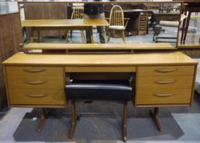 An Austinsuite mid 20th century dressing table, with a Frank Guille designed dressing stool.