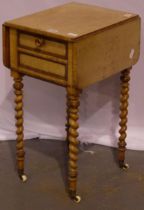 A Victorian Birdseye maple pot cupboard, with fall front and two drop-leaves, raise3d on twist