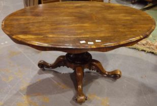 Victorian rosewood oval breakfast table with four carved supports and central column, 147 x 108 x 72