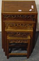 A 20th century nest of four Oriental hardwood graduating tables, largest 51 x 35 x 66 cm H.