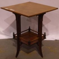 An early 20th century parlour table, with galleried under-shelf and four shaped supports, 56 x 56