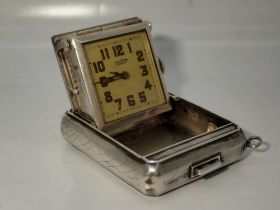 TISSOT: 935 silver cased folding travel clock, manual wind with square dial, working at lotting,
