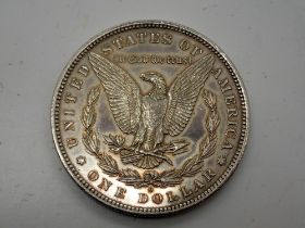 1884 O USA silver dollar, good condition. UK P&P Group 0 (£6+VAT for the first lot and £1+VAT for