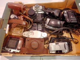 Selection of 35mm point and shoot cameras including Canon and Olympus with mixed vintage cased