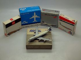 Five toy model aeroplanes, boxed. UK P&P Group 2 (£20+VAT for the first lot and £4+VAT for