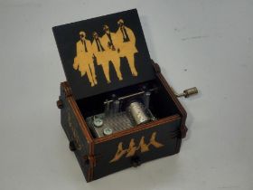 Wooden Beatles musical box, L: 66 mm. UK P&P Group 1 (£16+VAT for the first lot and £2+VAT for