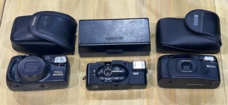 Three compact cameras, Pentax Zoom 105-R, Olympus XA2, and a Ricoh Shotmaster Tru-Zoom. UK P&P Group