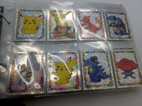 Album containing approximately 140 Topps Pokémon stickers. UK P&P Group 1 (£16+VAT for the first lot