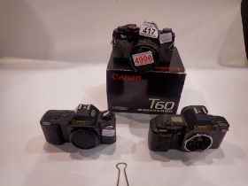 Canon T60 35mm SLR camera body with lens, boxed with a Canon T50 and Canon T70 camera bodies. UK P&P