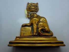 Brass Cheshire cat doorstop, H: 26 cm. UK P&P Group 2 (£20+VAT for the first lot and £4+VAT for