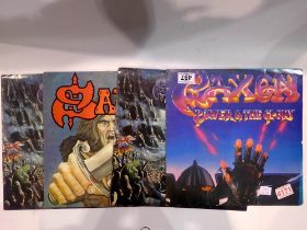 Four Saxon albums including Power & The Glory. UK P&P Group 2 (£20+VAT for the first lot and £4+