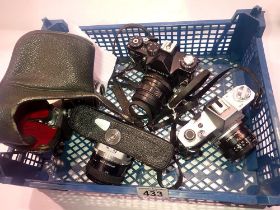 Three Topcon cameras, all firing, and a Zenit 12 XP. UK P&P Group 3 (£30+VAT for the first lot