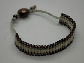 Links of London fabric bracelet with silver clasp, adjustable length. UK P&P Group 0 (£6+VAT for the