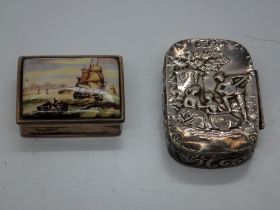 Hallmarked silver pillbox and a white metal example, largest 48 x 17 mm. UK P&P Group 1 (£16+VAT for