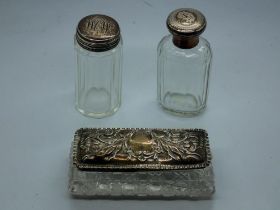 Three hallmarked silver topped glass jars, largest L: 10 cm. UK P&P Group 1 (£16+VAT for the first