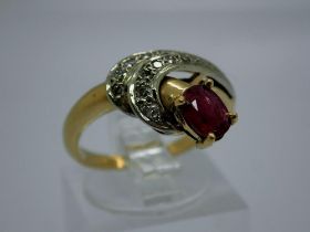 Contemporary 18ct gold ruby and diamond set crossover ring, size N/O, 4.1g. UK P&P Group 0 (£6+VAT