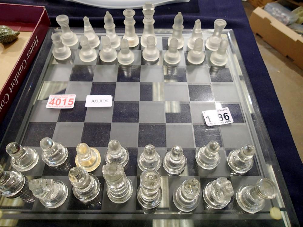 Glass chessboard with clear and frosted glass pieces (Complete). Not available for in-house P&P