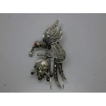 Early 20th century white gold bird form brooch set with diamonds and rubies, H: 60 mm, 14.4g, mark
