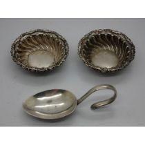 Pair of hallmarked silver open salts, each D: 50 mm, and a hallmarked silver medicine spoon,