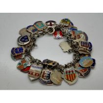 Silver charm bracelet with forty enamelled charms, L: 18 cm. UK P&P Group 0 (£6+VAT for the first
